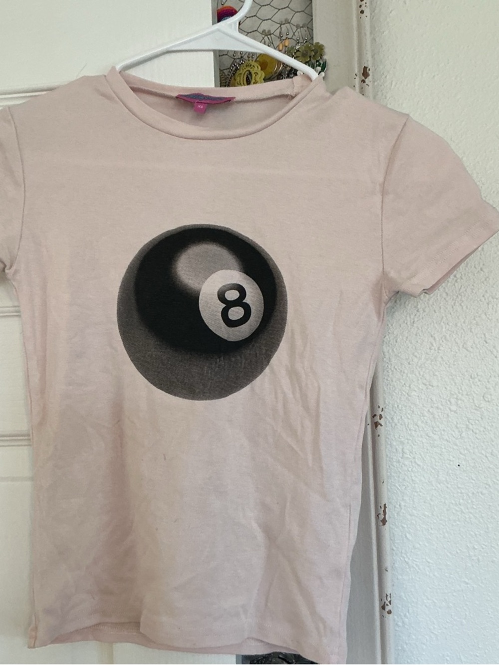 Edikted Light Pink Tee with Black 8-Ball Graphic